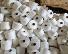 Yarn cones and spools in warehouse